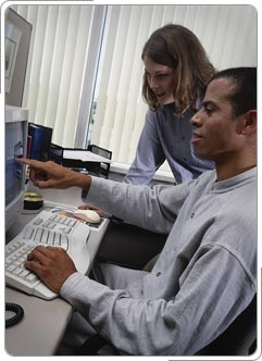  Taxpayer and volunteer at computer.